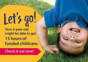 A young boy doing a headstand on grass with the words: Let's go! Your 2-year-old might be able to get 15 hours of funded childcare. Check it out now!