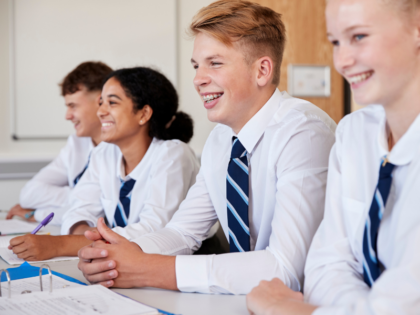 Group of secondary school pupils in class