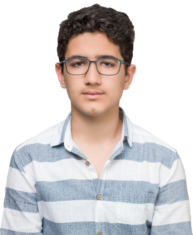 portrait photo of a teenage boy wearing glasses