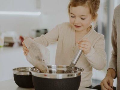 a girl doing some baking