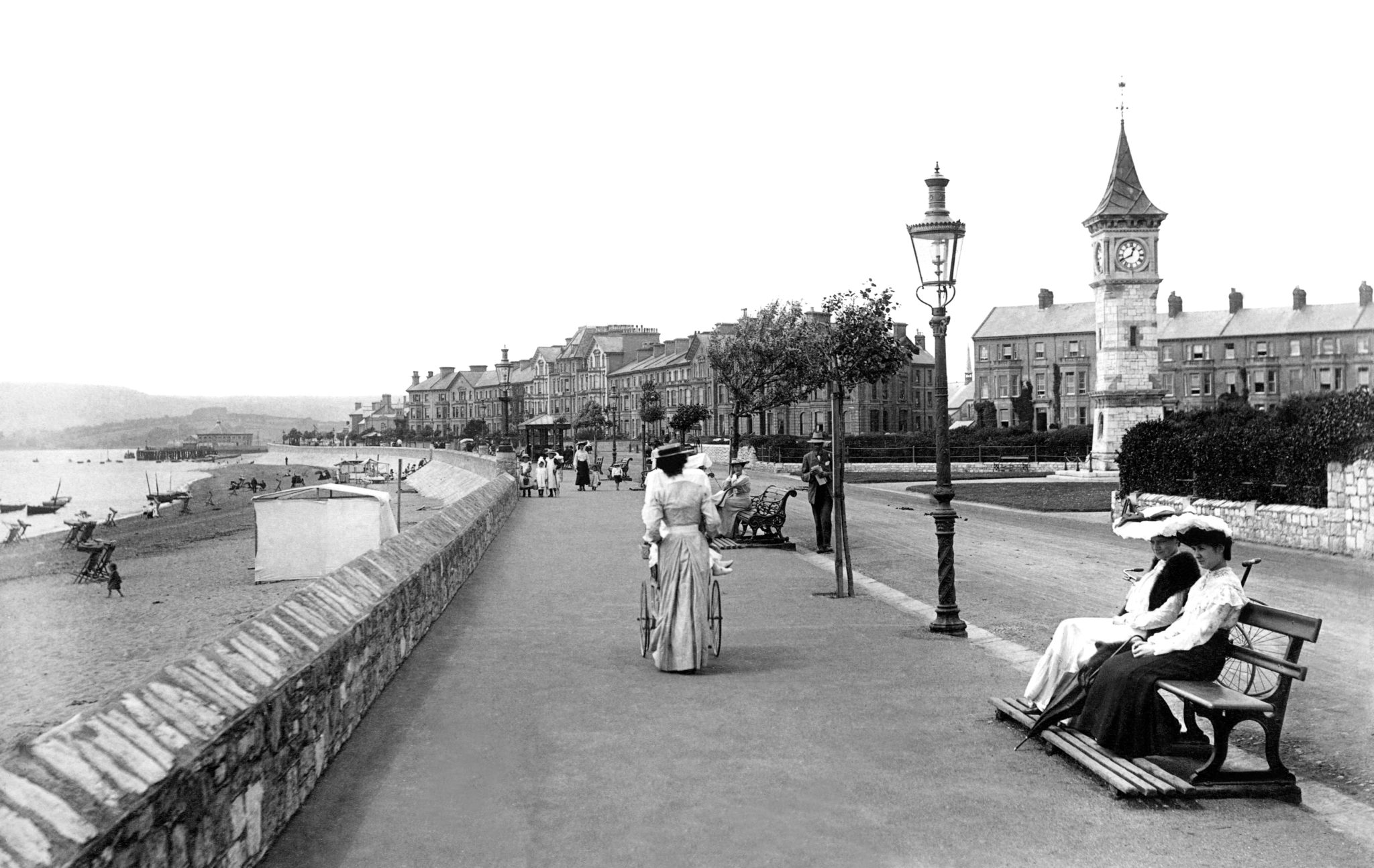 people walking along the sea front at Exmouth in 1928