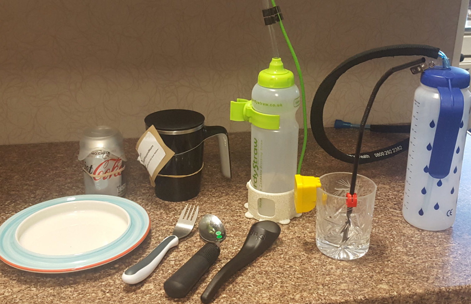 A range of cups, bottles and cutlery