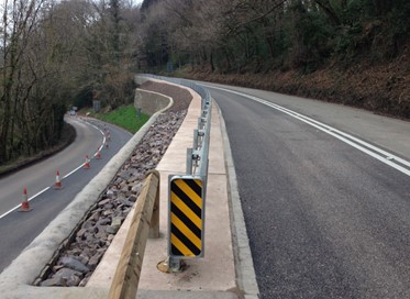 Image showing a new stretch of road with re-designed safety barrier.